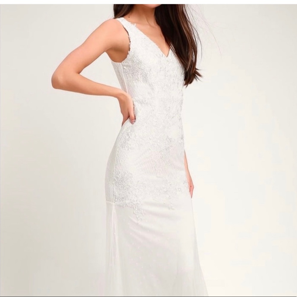 Wedding dress: White embroidered lace sleeveless